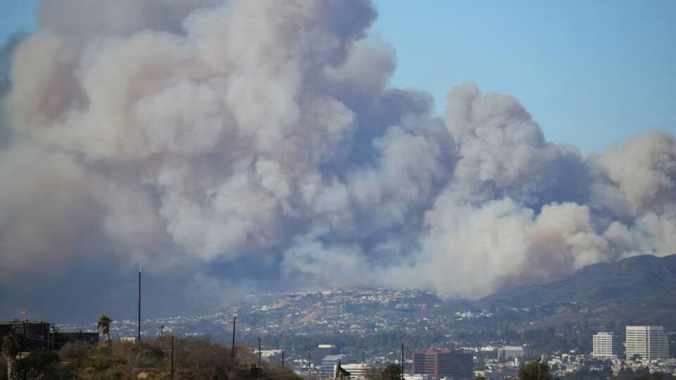 Raging Los Angeles wildfire engulfs upscale area, triggers evacuations